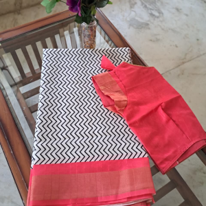 Chic Ivory & Black Chevron Printed Silk Saree with Coral Pink Zari Border